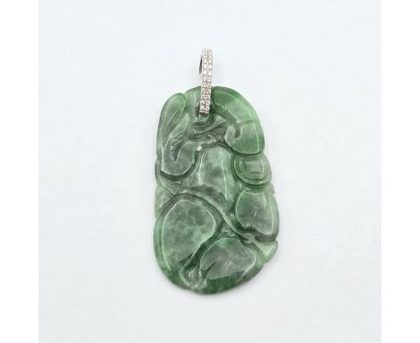 A carved Jade Pendant with detachable white metal bail pavé-set two rows of single-cut diamonds stamped 750, bail 2.1gms, pen
