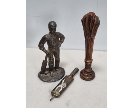 A cast metal figure of a cricketer and a miniature silver cricket bat with enamel decoration A/F and a bronze Seal with flute