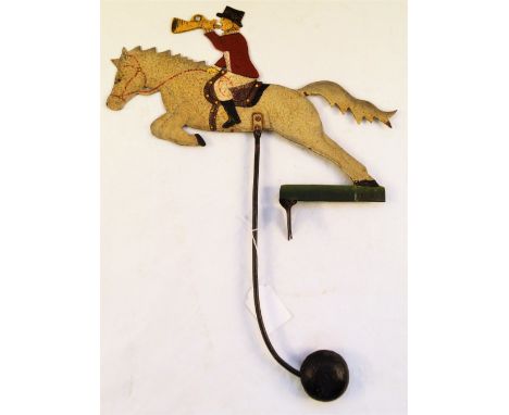 A vintage painted huntsman on horse back balance toy (no base)