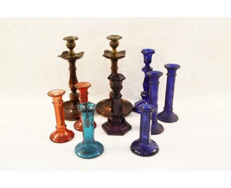 Victorian amethyst plus other coloured glass and wooden candlesticks