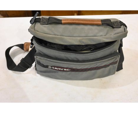 Bag containing various camera accessories - to include lenses mini tripods filters, flashes, disposable kodak cameras, leads,