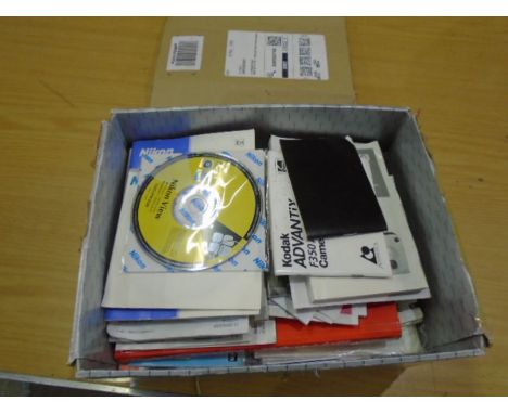 box of photographic guides, books and camera manuals