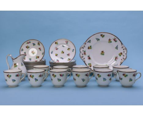 FLORAL PART SERVICE COFFEE SET
Late 19th Century
Decorated with floral sprigs, 
Comprising of two plates, a milk jug, eleven 