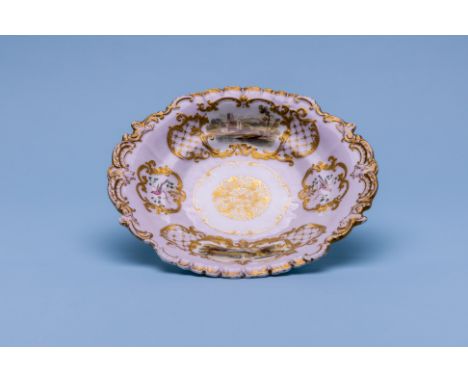 A COPELAND &amp; GARRETT OVAL DISH WITH NAMED VIEWS
Circa 1840, blue/green printed mark 
With gilt rocaille border and decora