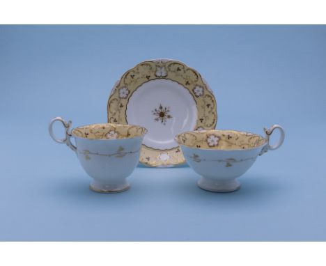 A GROUP OF THREE YELLOW GROUND TRIOS
Early-mid 19th Century
All with gilt decoration, one example with puce printed marks 

P