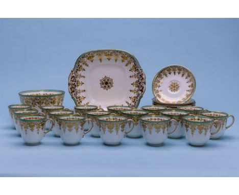 A DAVENPORT PART TEA SERVICE
Mid-late 19th Century, blue printed marks 
With green and gilt borders, comprising: seventeen cu