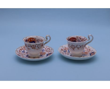 A PAIR OF IMARI COFFEE CUPS AND SAUCERS
Mid 19th Century
Decorated with a stylised landscape and flowers 

Please email hello