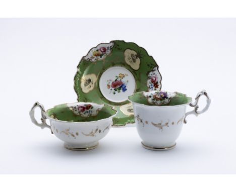 A GROUP OF THREE TRIOS
Comprising: 
A spirally fluted example, probably Worcester, late 18th Century; and two green ground ex