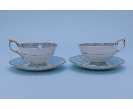 AN AYNSLEY HARLEQUIN PART TEA SERVICE
1st half 20th Century
Comprising eight cups and saucers, in four colours, with gild bor