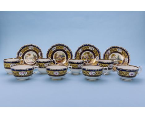 A PART LANDSCAPE TEA AND COFFEE SERVICE
Mid 19th Century
Decorated with English landscapes, within yellow, blue and gilt bord