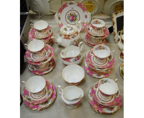 A Royal Albert tea service for ten Lady Carlyle pattern comprising teapot, milk jug, sucrier, cake plate, tea cups, saucers a