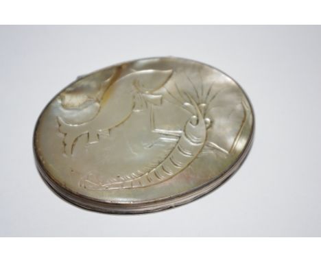 An early 19th century mother-of-pearl and white metal mounted snuff box, carved with shrimp and fish, 8cm wide, c.1810
