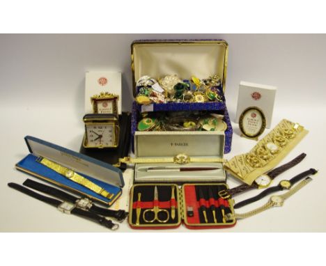 A jewellery box containing a silver bangle, hallmarked Birmingham 1957, a jade bead necklace, another jade heart pendant, var