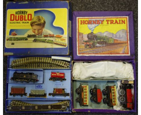 A Hornby Dublo Electric Train set comprising 0-6-2 engine, rolling stock - Royal Daylight Paraffin tanker, open wagon, freigh