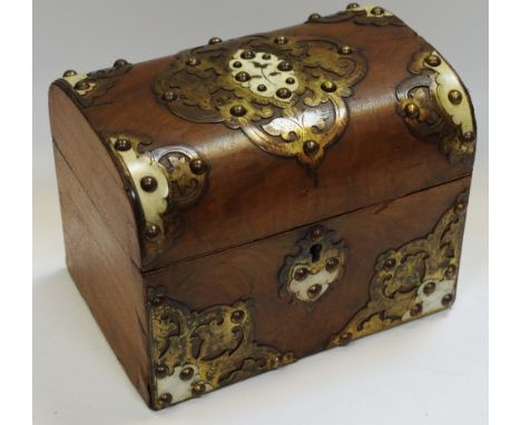 A Victorian walnut and cut-card work domed rectangular tea caddy, hinged cover enclosing a pair of lidded compartments, c.187