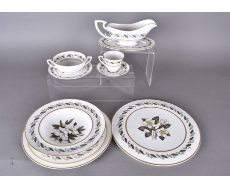 A Royal Worcester part 'Bernina' pattern dinner service, comprising 13 dinner plates, 12 lunch plates, 12 soup dishes, 12 twi