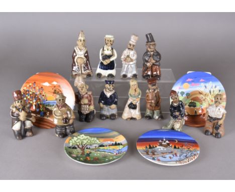 A set of Tremaen stoneware figures, modelled as people, and a set of four Poole Seasons plates designed by Barbara Furstenhof