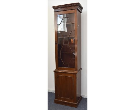 A Georgian astragal glazed elevated cabinet, with a single panel glazed door on a plinth style base, solid panel cupboard, fi