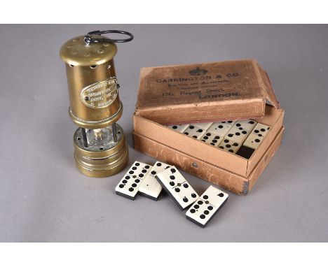 A set of 19th Century bone and ebony prisoner of war dominoes, in Carrington &amp; Co card box (af), a Ferndale coal miner's 