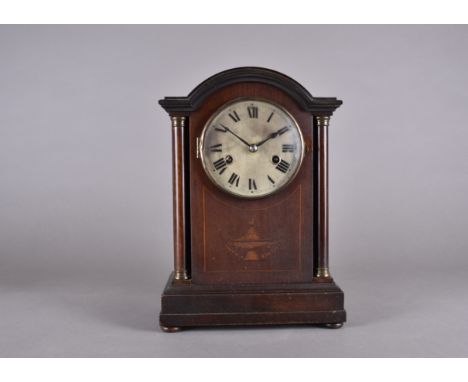 A mahogany inlaid eight day mantel clock, silvered dial, Roman numerals, 32 cm high 