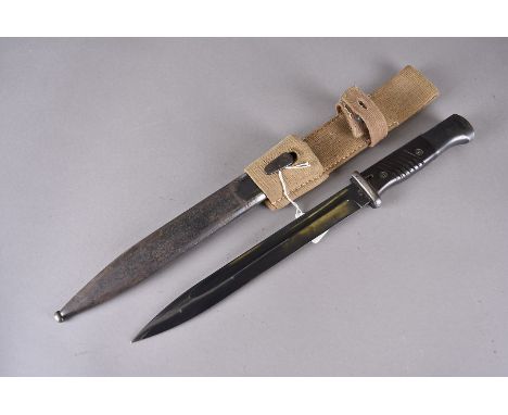 A German M1884/98 III bayonet, marked ab to one side of the 25cm long blade, 41 to the spine, serial number 8260, complete wi