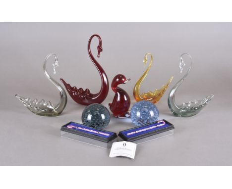 A group of Whitefriars glass weights, to consist of two controlled bubble paperweights pattern 9308 in Arctic Blue and Pale I