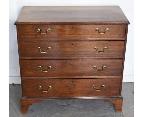 An early 20th Century mahogany chest-of-drawers, four graduated drawers, bracket feet, 99 cm wide x 52 cm deep x 95 cm high
