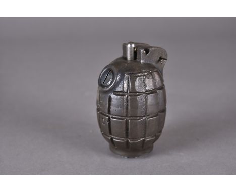 A WWII No.36M MkI hand grenade, marked to the base plus WD, also marked Q to the body, complete with striker, safety pin and 