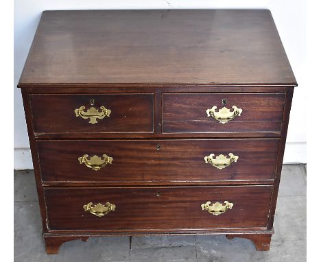 A Georgian mahogany cottage chest-of-drawers, two short over two long drawers, bracket feet, 78 cm wide x 48 cm deep x 69 cm 