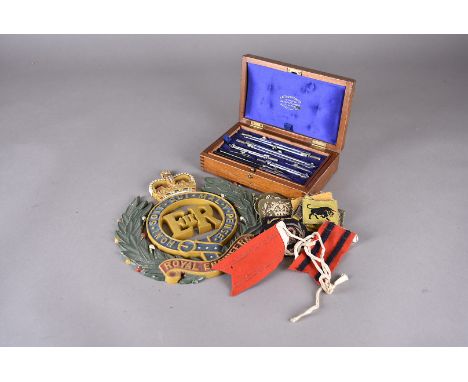 A collection of Royal Engineer items, including a geometry drawing set, in fitted case marked W.10/VC.5841 and broad arrow, a