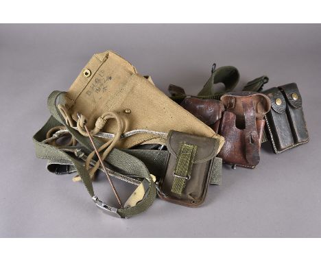 A WWII military issue pistol holster, by B.H.G Ld, dated 1942 with broad arrow, compete with cleaning rod, a 1952 issue penkn