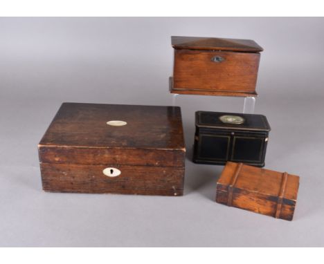 A collection of 19th Century treen boxes, including an ebonised hinged casket lid centred with a miniature of a floral spray,