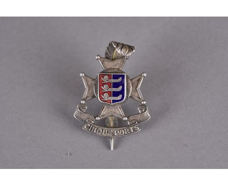 A 5th Cinque Ports Battalion Royal Sussex Regiment Officer's cap badge, the silver badge with cross design, having red and bl