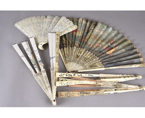 Four sets of 18th Century fan sticks with varying decoration, together with a folding fan painted with a hunting scene (28.5c