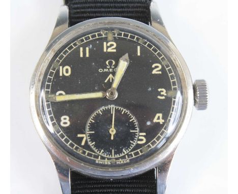 A gentleman's British military Omega W.W.W. wristwatch, circa 1940, part of the "Dirty Dozen", having a signed black dial wit