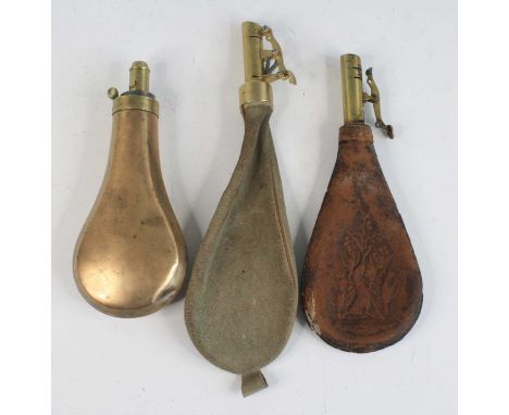 An early 20th century brass powder flask, of typical pear shape, the brass nozzle marked Dixon &amp; Sons, 20cm, together wit