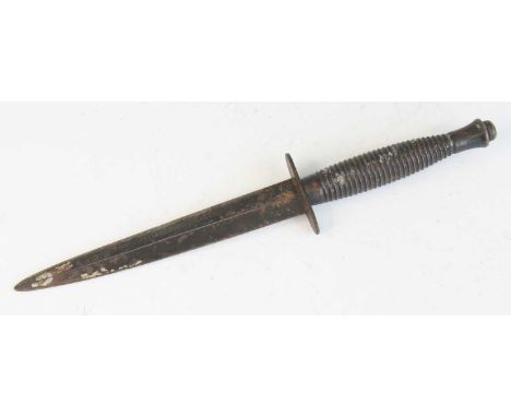 A British Fairbairn-Sykes 3rd Pattern Commando fighting knife, having a 16.5cm double edged spear-point blade, the oval cross