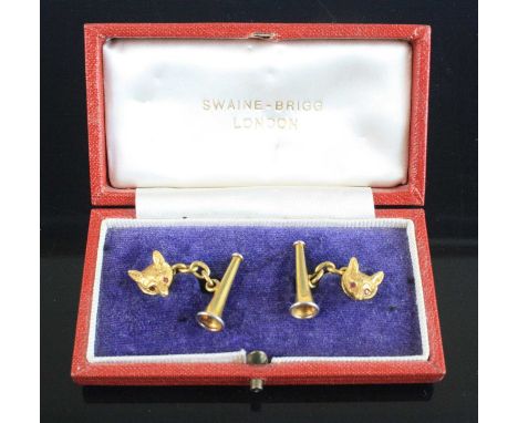A pair of gentleman's 9ct gold cuff-links, each in the form of a fox mask with naturalistic fur and ruby set eyes, the opposi