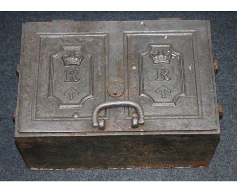 A Victorian cast iron Government Revenue / Military strong box, the hinged lid having twin panels each with a crown over R wi