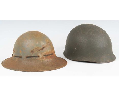 A WW II steel Zuckerman helmet, the leather liner marked BMB (Briggs Motor Bodies of Dagenham) and dated 1941 size 7, togethe