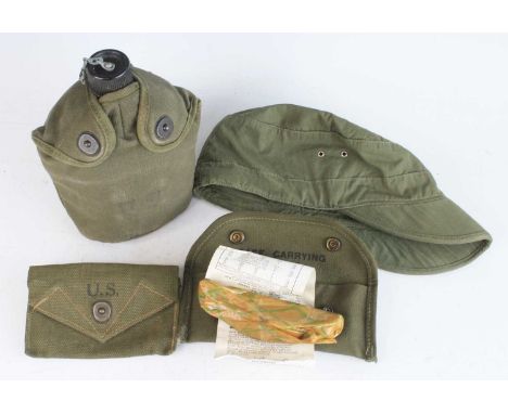 A WW II U.S. Army grenade launcher sight M15, sealed with instructions in canvas pouch dated 1944, together with various U.S.