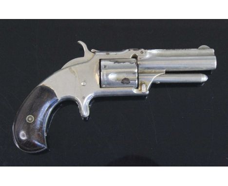 A 19th century Smith & Wesson .32 calibre rimfire five shot revolver, with nickel plated finish, the 7cm barrel stamped to th