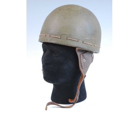 A WW II British Dispatch Rider's helmet, of green painted fibre construction, the rim with twin ribs and cord fastening with 