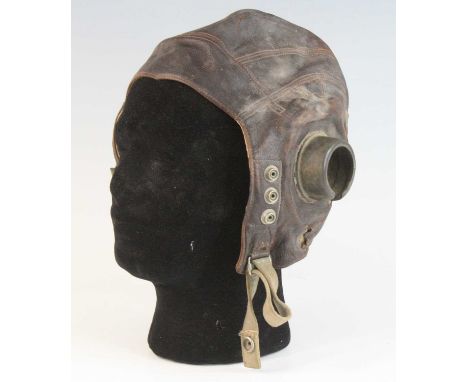 A post WW II R.A.F. type C leather flying helmet, the chamois interior marked No. 4 7 1/2, together with a Sam Browne belt an
