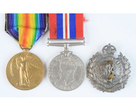 A WW I Victory medal, naming 25689 PTE. H.J. THOMPSON NORF. R., together with a WW II War medal and a Royal Engineers cap bad