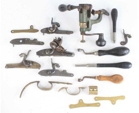 A 19th century cast iron and brass mounted cartridge loader, by James Dixon &amp; Sons, 15cm, together with various gun parts
