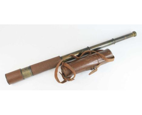 A brass and leather clad four drawer telescope, the eye-piece marked to the rim O.S. 1643 A, housed in a brown stitched leath