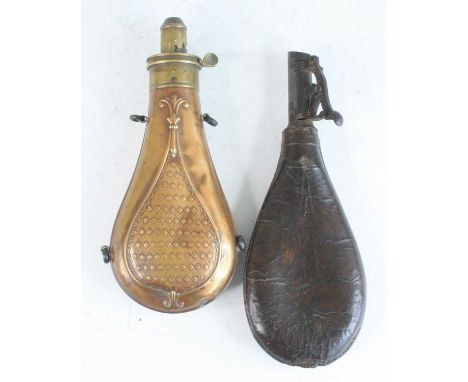 A 19th century copper powder flask, of typical pear shape, the brass nozzle measuring 2 1/4 - 3 drams marked G. &amp; J.W. Ha