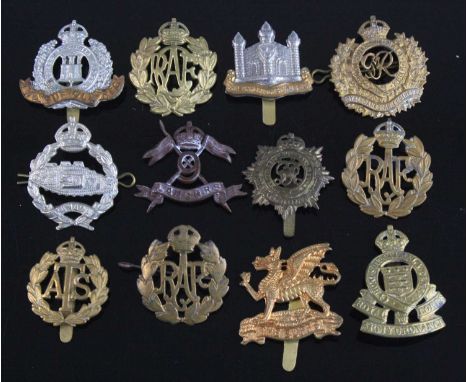 A collection of cap badges, to include Cambridgeshire Regiment, Suffolk Regiment. Westminster Regiment, Hampshire, Royal Army