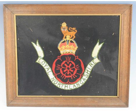 An embroidered panel for the Loyal North Lancashire Regiment, 48 x 59cm, together with two prints after Captain E.A. Campbell